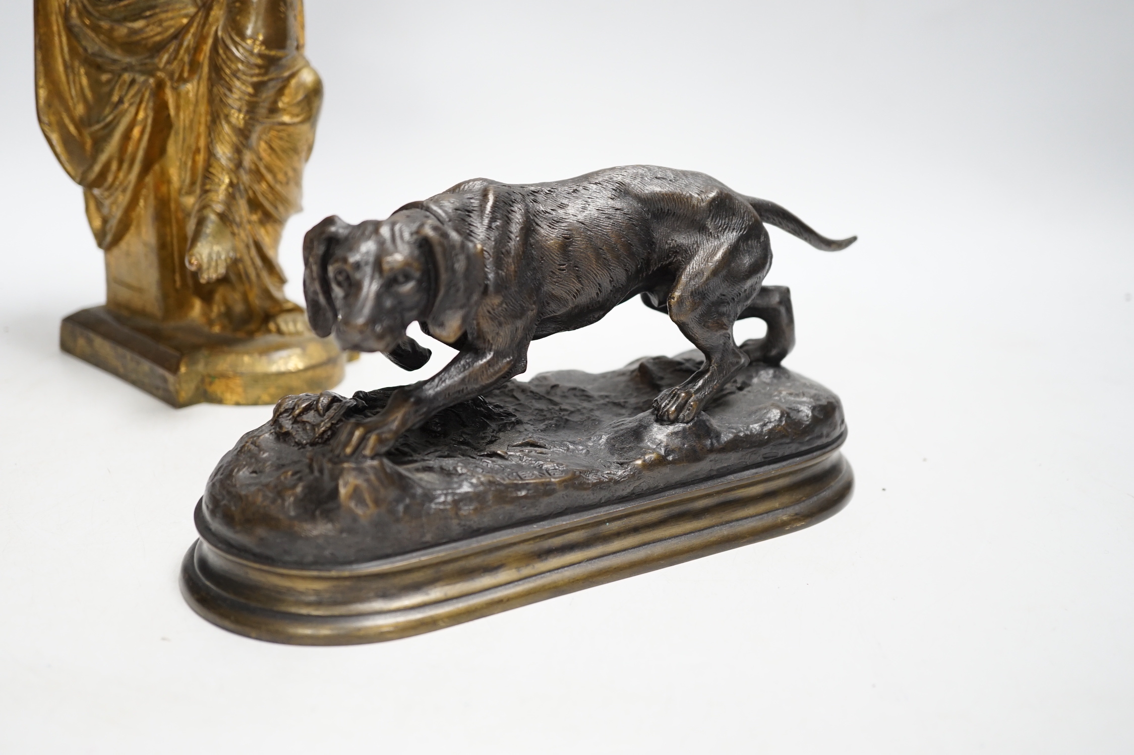 A gilt metal classical figure and a bronze of a dog, 26cm high